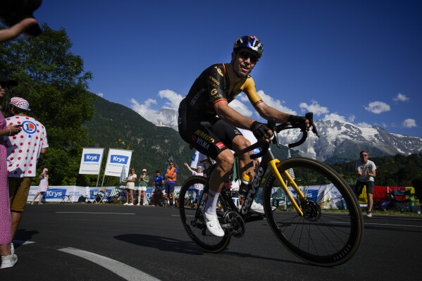 Vingegaard keeps yellow jersey at Tour de France as Poels soloes